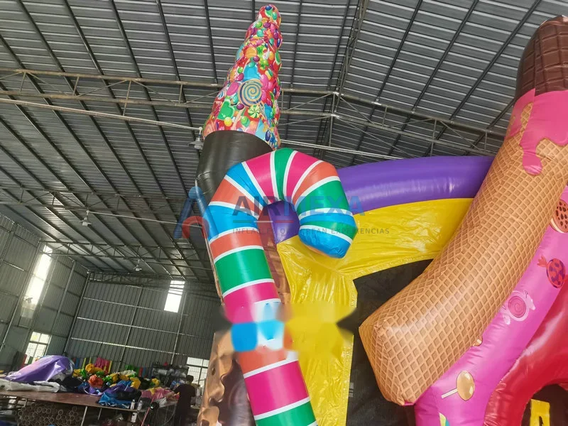 Castillo inflable temático de dulces y helado para fiestas infantiles