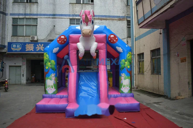 Castillo inflable combo con temática de unicornio disco y resbaladilla
