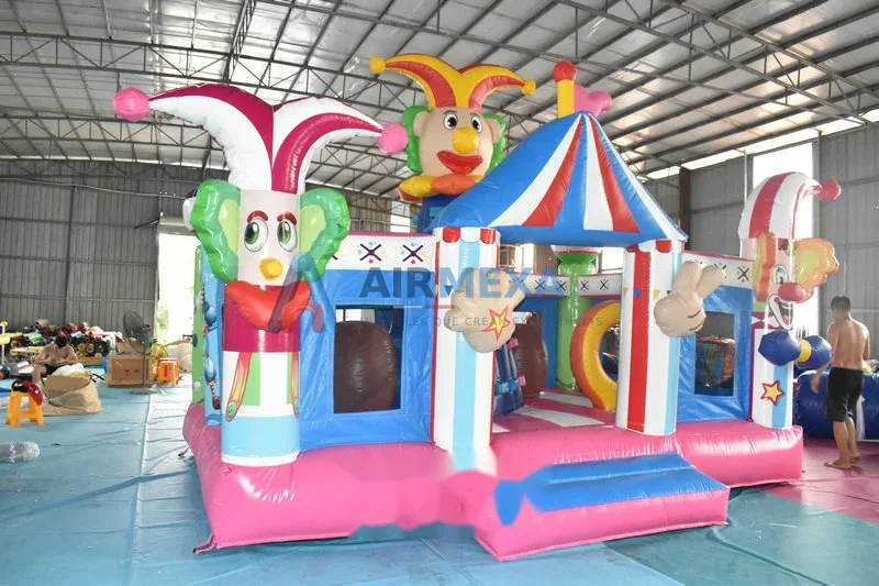 Castillo inflable combo con temática de circo y payaso, resbaladilla incluida