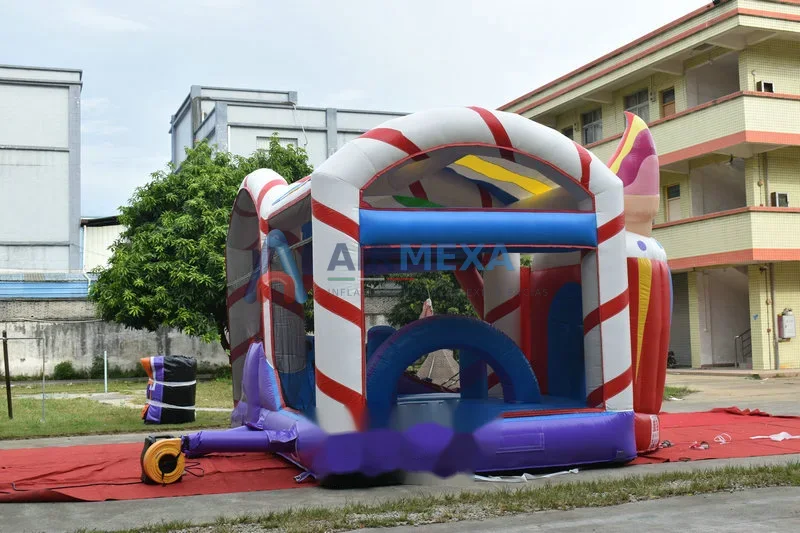 Castillo inflable combo temática de dulces con resbaladilla y área de brinco
