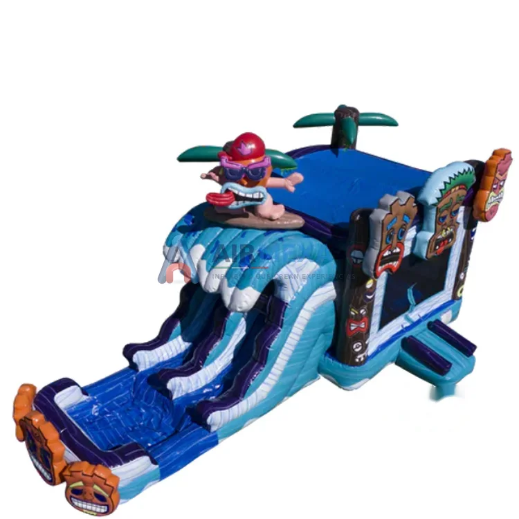 Combo inflable temática tiki con brincolín y doble resbaladilla instalado al aire libre