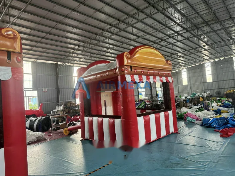 Carpa inflable compacta usada como taquilla o punto de venta en evento